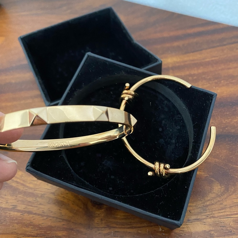 Set of two rose gold MVMT bangles